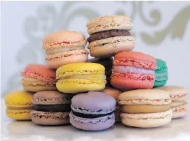  ??  ?? Rainbow-hued macarons are irresistib­le at Sandrine French Pastry and Chocolate in Kelowna.