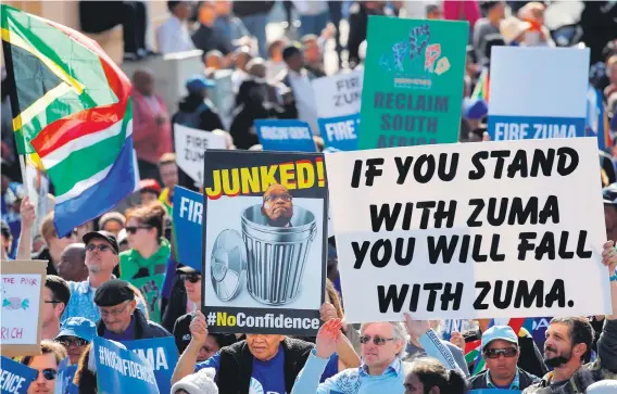  ?? Picture: Reuters ?? STAND OR FALL. Protesters march ahead of the vote of no confidence in President Jacob Zuma in Cape Town on Tuesday.