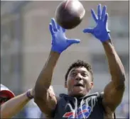  ?? ADRIAN KRAUS - THE ASSOCIATED PRESS ?? In this July 27, 2018, file photo, Buffalo Bills wide receiver Zay Jones catches a pass after practice at the NFL football team’s training camp in Pittsford, N.Y. Jones has learned the hard way there are no overnight sensations in the NFL now that he’s starting to catch on in his second season. The second-round draft pick has put aside his past on- and off-field troubles in showing strides of becoming a reliable threat. Jones leads the Bills in catches and yards as Buffalo comes out of its bye week off to host Jacksonvil­le this weekend.