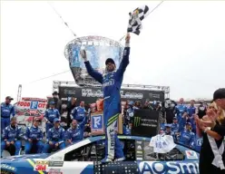  ?? AP PHOTO ?? RIDING HIGH: Jimmie Johnson celebrates his victory in yesterday’s NASCAR race in Bristol, Tenn.