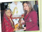  ??  ?? President Pratibha Patil presents the Arjuna Award to Jwala Gutta.