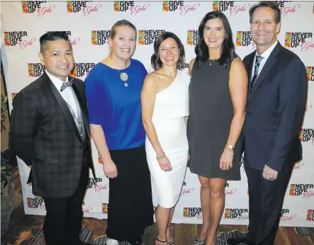  ?? BILL BROOKS ?? From left, at Wood’s Homes Never Give Up Gala Sept. 29 at Hyatt Regency Calgary are gala co-chair Eric Perez, emcee and food writer Julie van Rosendaal, gala co-chair Shannon Glover, Wood’s Homes board chair Heather Heasman and emcee, CBC’s Doug Dirks.