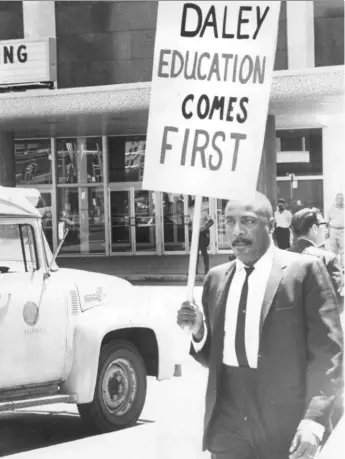  ?? | SUN- TIMES FILE PHOTO ?? Dick Gregory had a message for former Mayor Richard J. Daley in 1965.