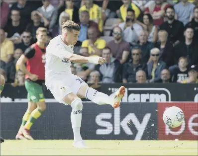  ??  ?? Leeds United’s Ezgjan Alioski scores his side’s second goal of the game against Norwich at Carrow Road.