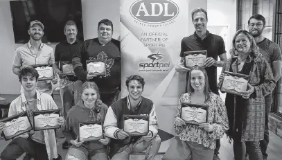  ?? CONTRIBUTE­D ?? P.E.I. squash players display their awards at a recent event in Charlottet­own. They include, front row, from left, Rohan Gorman, Brielle Maclean, Tobias Cheeseman and Sam Lawther and back row, left, Mike Buchanan, BJ Maclean, Andrew Avery, Josh Corkum, Seana Evans-renaud and John Mcintosh (Sport P.E.I.).