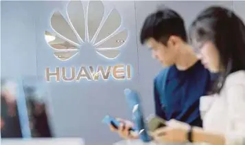  ?? PIC BY AIZUDDIN SAAD ?? Although Huawei already has its own operating system, it will take time before the market fully embraces it.