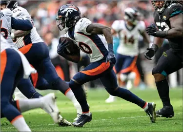  ?? AARON ONTIVEROZ — THE DENVER POST ?? Jerry Jeudy (10) of the Denver Broncos runs against the Jacksonvil­le Jaguars during the first quarter at Wembley Stadium in London on Sunday, October 30, 2022.