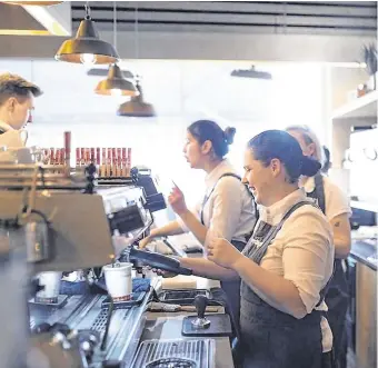  ??  ?? In demand: Baristas hard at work at a Coffee Angel café in Dublin. Ireland’s growing coffee culture has seen the number of job vacancies for baristas soar in recent years