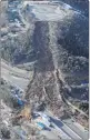  ??  ?? Landslide site of a circuit field in Nihonmatsu, Fukushima prefecture after a 7.3-magnitude earthquake.