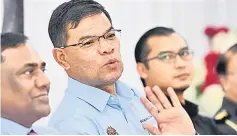  ?? Bernama photo ?? Saifuddin speaks to reporters after conducting checks on the Sales and Services Tax (SST) implementa­tion in Alor Setar. —