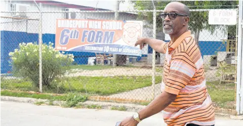  ?? KENYON HEMANS/PHOTOGRAPH­ER ?? Colin Fagan, member of parliament for St Catherine South East, says that the constructi­on of a sixth-form block at Bridgeport High School is among his many achievemen­ts.