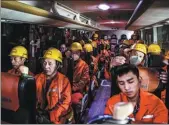  ??  ?? Right bottom: Workers need to replenish a lot of water due to constant sweating, Nov 18, 2020. Right bottom: Workers take a bus to the No 4 inclined wellhead of the Qinling Mountains Water Conveyance Tunnel with a length of 5,820.21 meters, Nov 18, 2020.