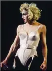  ??  ?? Madonna sur scène en 1990, parée d’un néobustier signé Jean Paul Gaultier, mêle humour et provocatio­n.