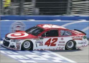  ?? ALEX GALLARDO — THE ASSOCIATED PRESS ?? Kyle Larson crosses the start/finish line during qualifying at Auto Club Speedway in Fontana, Calif. on Friday.