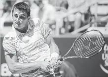  ?? CANADIAN PRESS FILE PHOTO ?? Australia’s Bernard Tomic must give up his full prize money of US$56,500 for not meeting “profession­al standards” at Wimbledon.