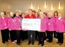  ?? Janelle Jessen/Herald-Leader ?? Siloam Springs Regional Hospital Auxiliary donated $2,500 to the Siloam Springs Senior Activity and Wellness Center’s Meals on Wheels program on Feb. 26.