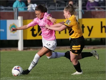  ??  ?? McKenna Davidson of Wexford Youths is chased by Kayla Cooling of Kilkenny United.