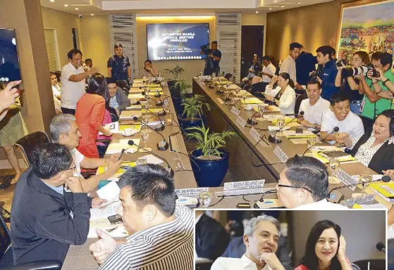  ??  ?? Metro Manila mayors, along with Metropolit­an Manila Developmen­t Authority and Department of the Interior and Local Government officials, gather for a meeting of the Metro Manila Council at the MMDA headquarte­rs yesterday. Inset shows Mayors Joy Belmonte and Toby Tiangco talking on the sidelines of the meeting. BOY SANTOS