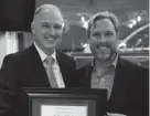  ?? COY CYPERT/OBU ?? Rev. Hance Dilbeck accepts Oklahoma Baptist University’s J.M. Carroll Award from OBU President Heath Thomas on Tuesday during the Southern Baptist Convention’s annual meeting in Nashville, Tennessee.