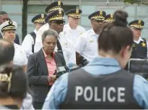  ?? TERRENCE ANTONIO JAMES/ CHICAGO TRIBUNE ?? Mayor Lori Lightfoot outside Stroger Hospital where a Chicago police officer was being treated after being shot July 1.