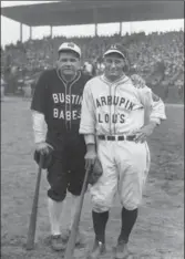  ?? THE ASSOCIATED PRESS ?? An October 1927 file photo showing New York Yankees stars Babe Ruth, left, and Lou Gehrig during an exhibition game.