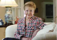  ?? Associated Press ?? ■ Author Mary Higgins Clark poses in her home June 3, 2004, in Saddle River, N.J. Clark, the tireless and long-reigning "Queen of Suspense" whose tales of women beating the odds made her one of the world's most popular writers, died Friday.