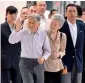  ?? AFP ?? japanese emperor akihito waves to people before departing Tokyo station for the imperial Villa in nasu to spend a vacation. —