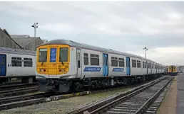  ??  ?? With its FLEX conversion completed, 319010 is seen at Eastleigh Works on December 9, 2020 awaiting its new interior, livery and set number. (Carl Watson)