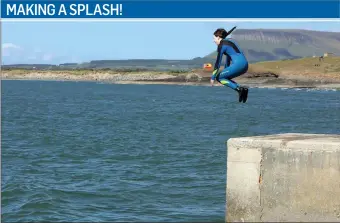  ??  ?? Taking a plunge at Rosses Point last Sunday. Pic: Carl Brennan.