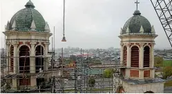  ??  ?? Bells being removed from Timaru’s Sacred Heart Basilica last year.