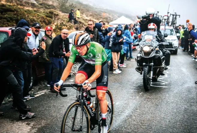  ??  ?? Pogačar during his brilliant solo break on stage 20 of the Vuelta, which gained him a podium place