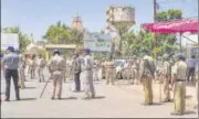  ?? PTI ?? ■
Heavy police deployment after migrant workers clashed with police during a protest at Mora village in Surat, Saturday.