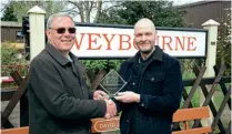 ?? KAREN RICHARDSON ?? NNR Chairman Steve Allen (left) receives the 2022 HRA Lifetime Achievemen­t Award from RM editor Paul Bickerdyke at Weybourne on April 19.