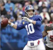  ?? JULIO CORTEZ - THE ASSOCIATED PRESS ?? Eli Manning prepares to throw during Giants’ win on Sunday, Nov. 18, 2018, in East Rutherford, N.J.