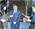  ??  ?? Shinzo Abe apologises to the public on behalf of the finance ministry