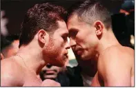 ?? AP/Las Vegas Review-Journal/ERIK VERDUZCO ?? Canelo Alvarez(left) and Gennady Golovkin pose during a weigh-in Friday at T-Mobile Arena in Las Vegas. Alvarez and Golovkin will fight tonight in a middleweig­ht title bout.