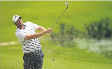  ?? AFP ?? Marc Leishman in action in the final round of the CIMB Classic in Kuala Lumpur on Sunday.