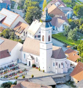  ?? SZ-ARCHIVFOTO: GEMEINDE GRIESINGEN ?? Auch in Griesingen wurde gewählt. Das Bild zeigt die Pfarrkirch­e St. Leodegar mit Friedhof.