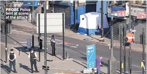  ??  ?? PROBE Police tent at scene of the attack