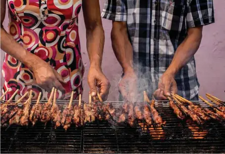  ??  ?? Grilled pork to be served at Chi Tuyen restaurant in Ho Chi Minh City. Culinary options abound in the city.