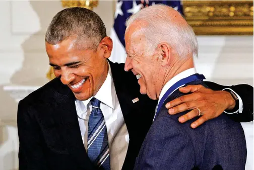  ?? File/tribune News Service ?? President Barack Obama jokes with Vice President Joe Biden after he presented him the Medal of Freedom during an event in the State Dining room of the White House in Washington.