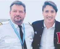  ?? COURTESY BRADLEY SMALL ?? Capt. Bradley Small — above with Justin Trudeau in 2019 — piloted Trudeau's campaign plane, a 737, in the first
two weeks of the election that year.