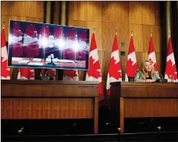  ?? CP PHOTO SEAN KILPATRICK ?? Minister of Middle Class Prosperity and Associate Minister of Finance Mona Fortier holds a press conference as she is joined virtually by Minister of Finance Chrystia Freeland in Ottawa on Monday.