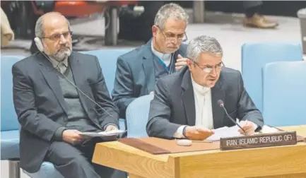  ?? Mary Altaffer, The Associated Press ?? Iranian Ambassador to the United Nations Gholamali Khoshroo, front, speaks Friday at United Nations headquarte­rs during a Security Council meeting on the situation in Iran.