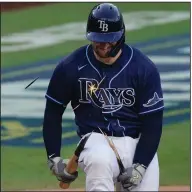  ?? (AP/Ashley Landis) ?? Mike Zunino of the Tampa Bay Rays breaks his bat after striking out in the fifth inning of the Rays’ 7-4 loss to the Houston Astros in Game 5 of the American League Championsh­ip Series on Friday. Houston, which once trailed 3-0 in the series, has tied it at 3-3.