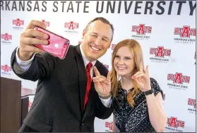  ?? Arkansas Democrat-Gazette/BENJAMIN KRAIN ?? Kelly Damphousse, who will become chancellor of Arkansas State University on July 1, poses with ASU student body president Haley Stotts after he was introduced Wednesday in Little Rock.