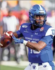  ??  ?? Georgia State quarterbac­k Dan Ellington is shown in the first half during the Arizona Bowl college football game against Wyoming in Tucson, Ariz. Former Georgia State quarterbac­k Dan Ellington, the team’s starter the last two years, is joining coach Shawn Elliott’s staff as an assistant coach.