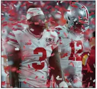  ?? (AP/Chris O’Meara) ?? Ohio State players leave the field after their loss to Alabama on Monday night in Miami Gardens, Fla. The Buckeyes, the Big Ten Conference champions, finished 7-1.