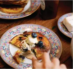  ?? Tribune News Service ?? ■ Blueberry pancakes.