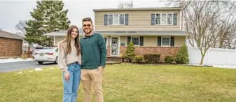  ?? TONY CENICOLA/THE NEW YORK TIMES ?? Jen Gorgano and Mike Stillman outside her childhood home Feb. 23 in New York.